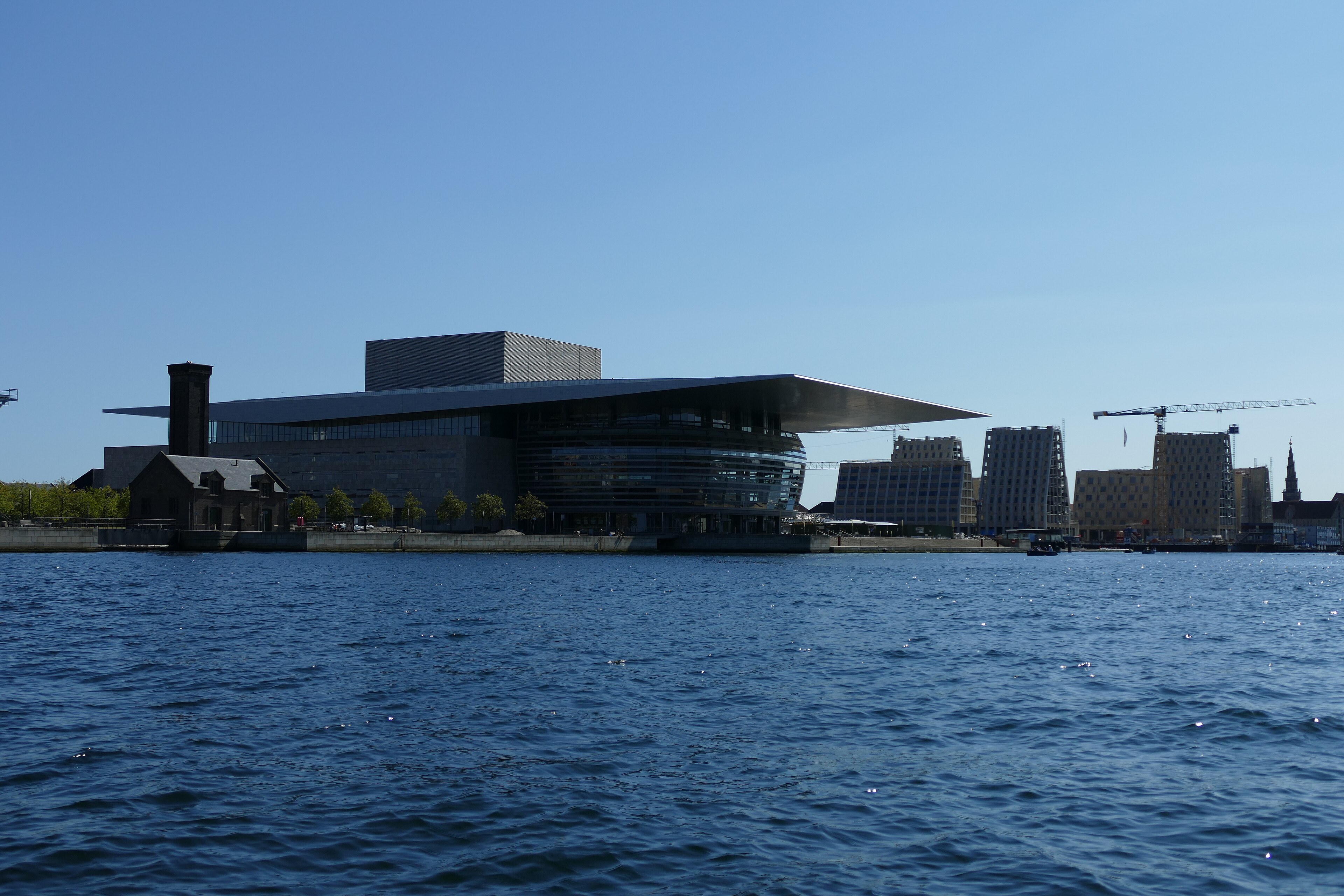 The Copenhagen Opera House seen across the harbour water